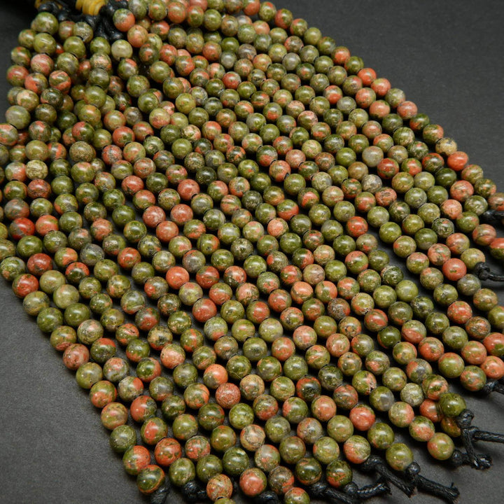 Drab green and pinkish orange unakite large hole beads.