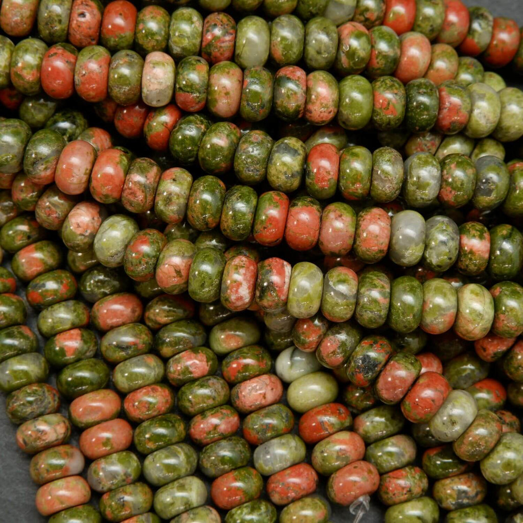Polished finish green and orange unakite rondelle beads.
