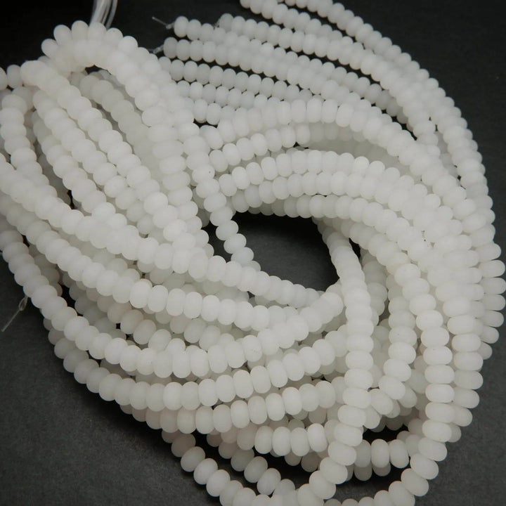 Matte finish white jade beads.