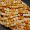 Mixed yellow aventurine beads.