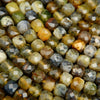 Yellow dendritic opal cube shape beads.