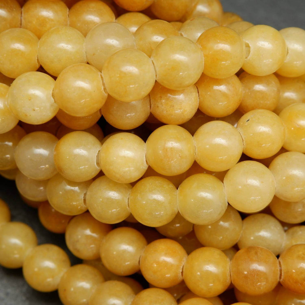 Yellow jade large hole loose beads.