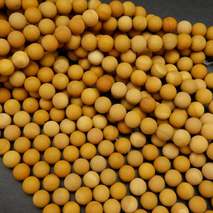 Matte finish yellow mookaite beads.