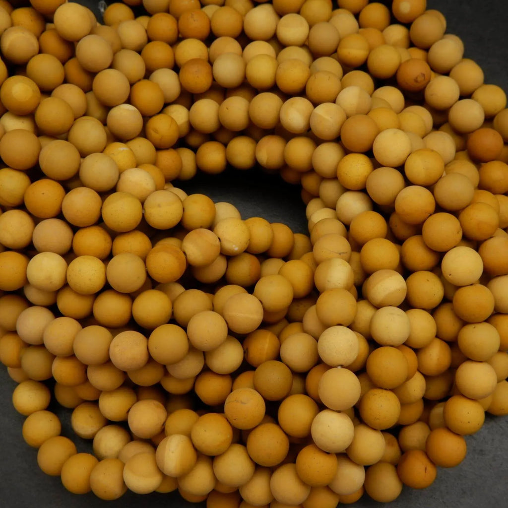 Matte finish yellow mookaite beads.