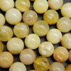 Natural Yellow Opal Beads. Round yellow beads on a string for jewelry making.