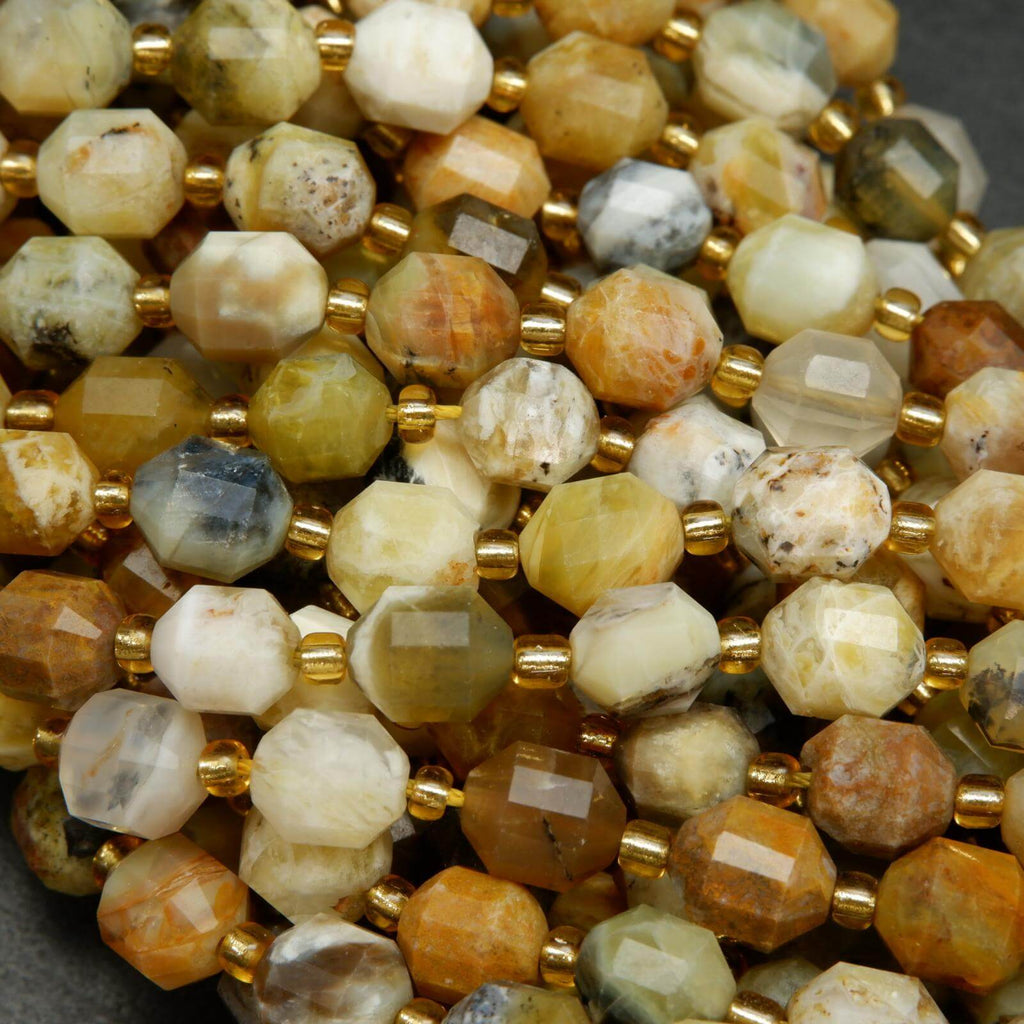Dendritic yellow opal energy prism beads.