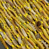 Beige and yellow roman glass tube beads.